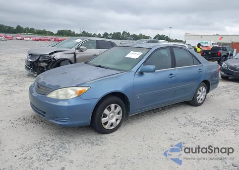 2002 Toyota Camry Le z USA, uszkodzony, nr VIN 4T1BE32K22U573578